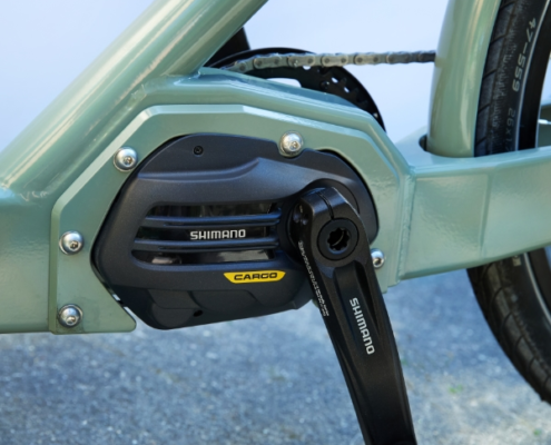 Siigar bikes siigar bike ladcykel er udstyret med komplet shimano steps udstyr batteri motor og gearskiftemotor Alt sammen med til at give en effektiv udnyttelse af energien og sikre en komfortabel cykeltur selv med tungt læs i ladet